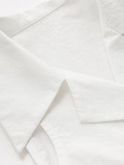 Collared Sleeveless Knotted Cropped Blouse